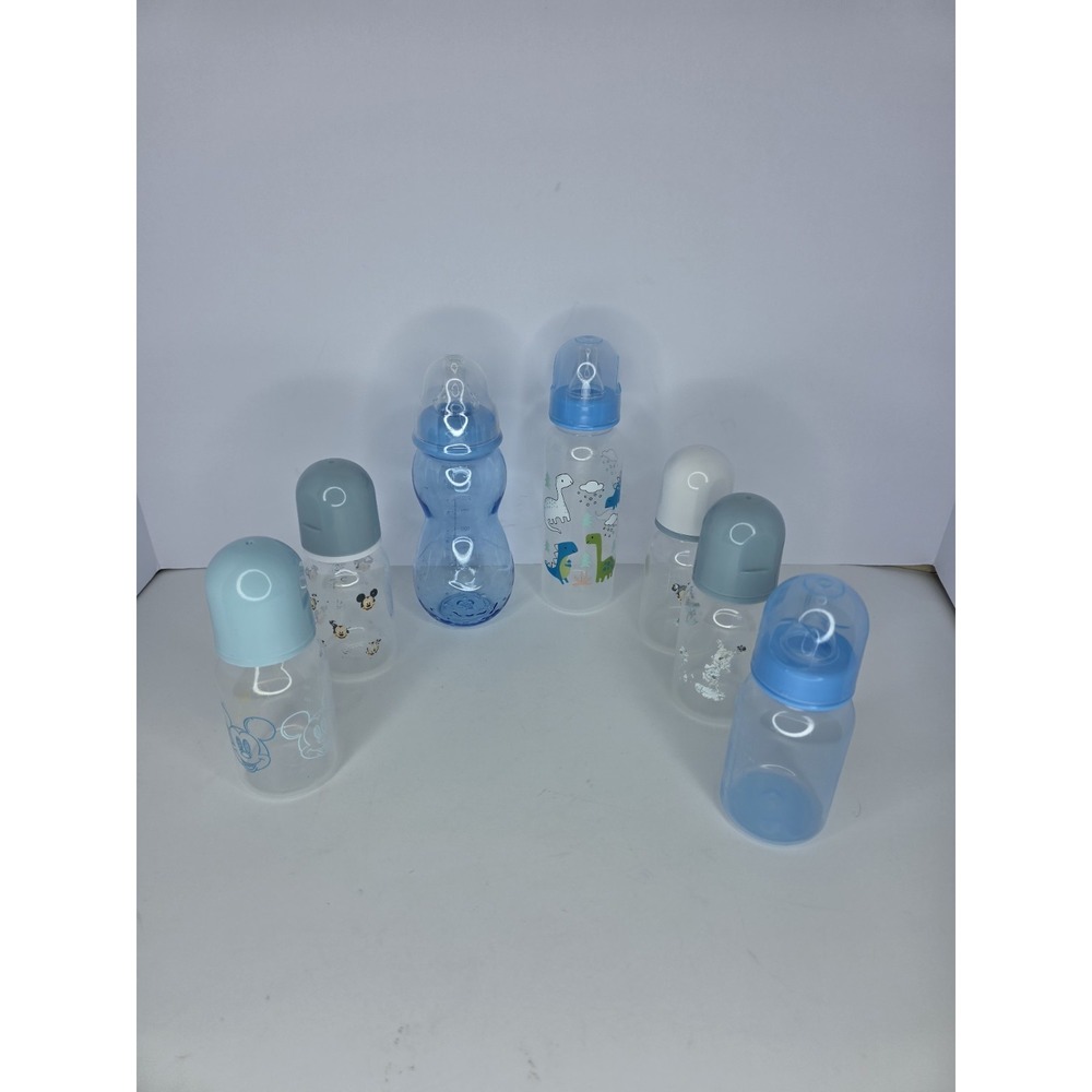 7: 2 Baby King 9‎ & 5 oz & 4 Cudlie 4 oz. & 1 Nuby 10 oz. Clear & Blue Bottles
